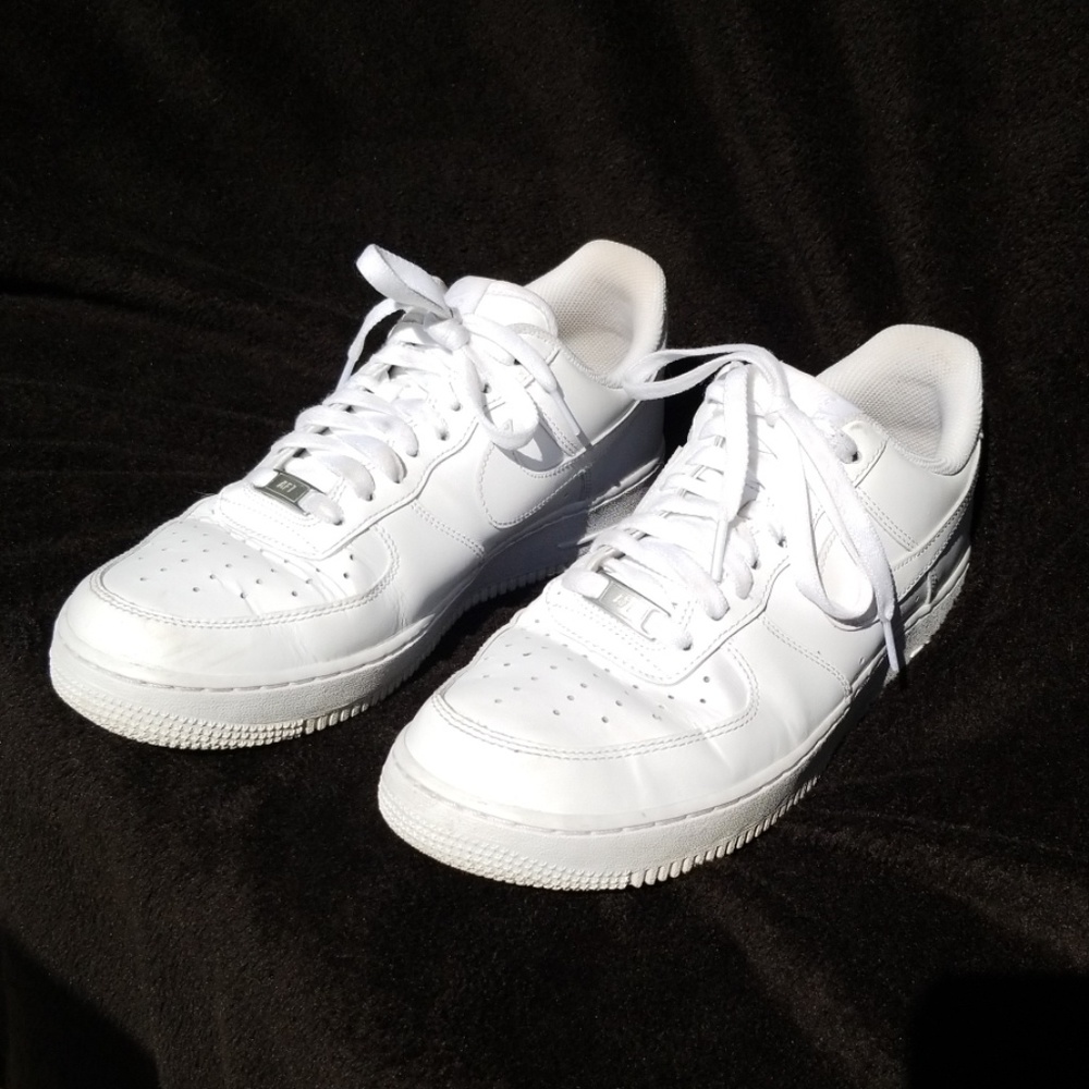 Nike Air Force Ones, all white low-top
